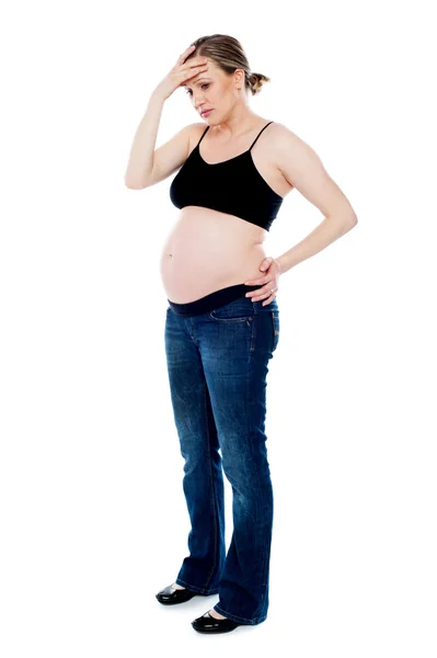 Mulher grávida com dor de cabeça — Fotografia de Stock
