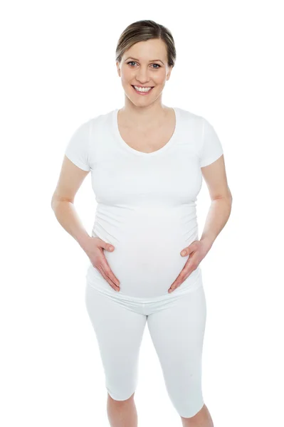 Embarazada sosteniendo su barriga —  Fotos de Stock