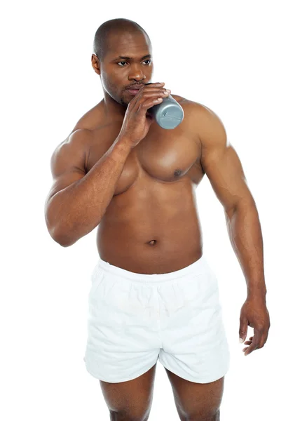 Muscular male drinking health drink — Stock Photo, Image