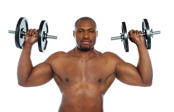 Shirtless african male holding dumbbells — Stock Photo, Image