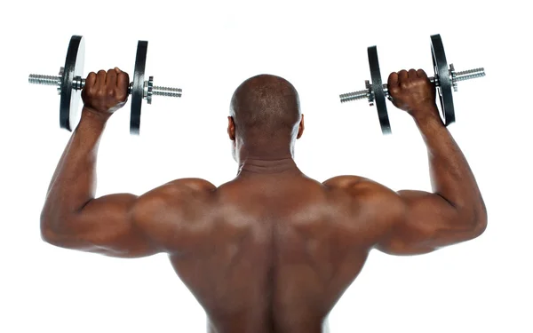 Rear view of a young male bodybuilder — Stock Photo, Image