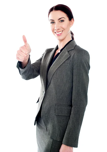 Успішна бізнес-леді показує великі пальці вгору — стокове фото