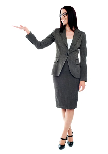 Full length of businesswoman showing copyspace — Stock Photo, Image