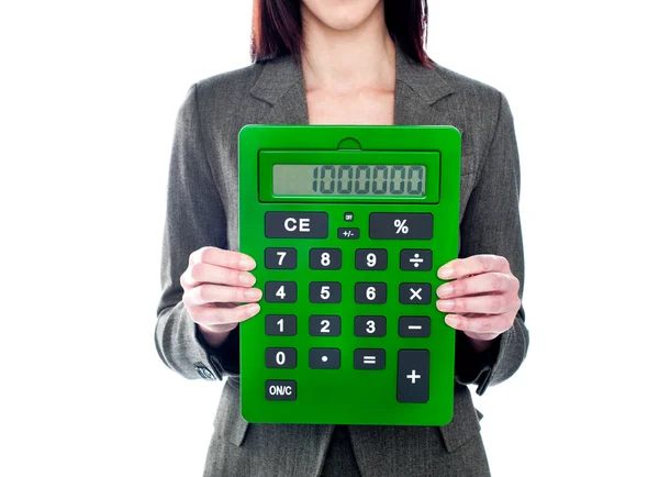 Business woman holding calculator. Focus on calculator — Stock Photo, Image