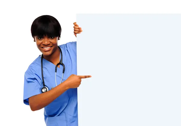 Mediziner zeigt auf Plakat — Stockfoto