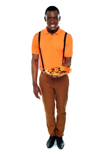 Full length portrait of delivery boy with pizza — Stock Photo, Image