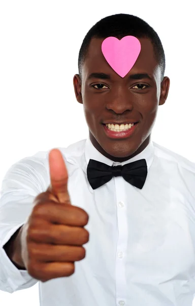 Love african boy gesturing thumbs-up — Stock Photo, Image