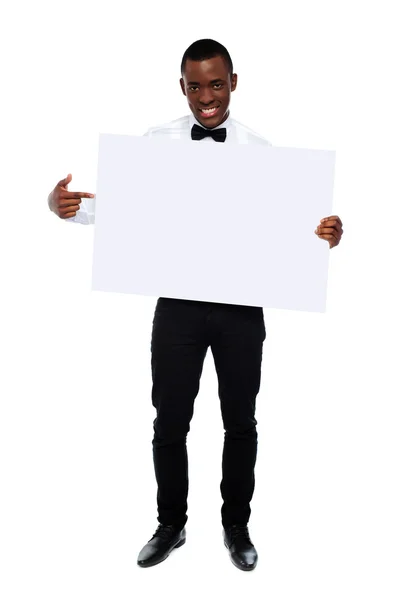 Guy indicating towards blank whiteboard — Stock Photo, Image