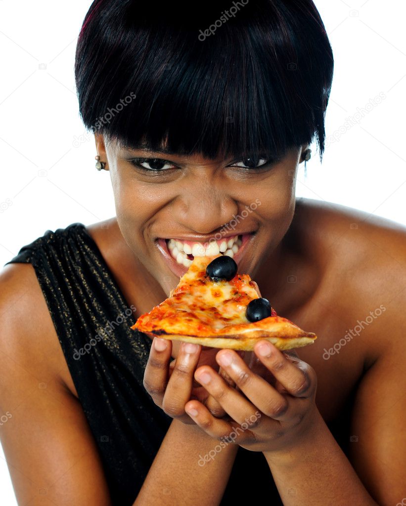 Woman enjoying pie of a pizza