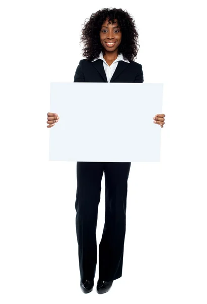 Business lady promoting big blank banner ad — Stock Photo, Image