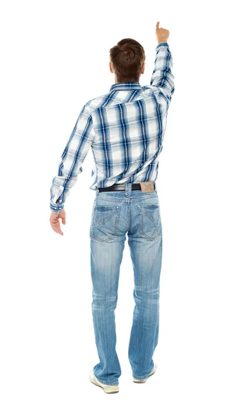 Rear view of a male indicating towards copy space — Stock Photo, Image