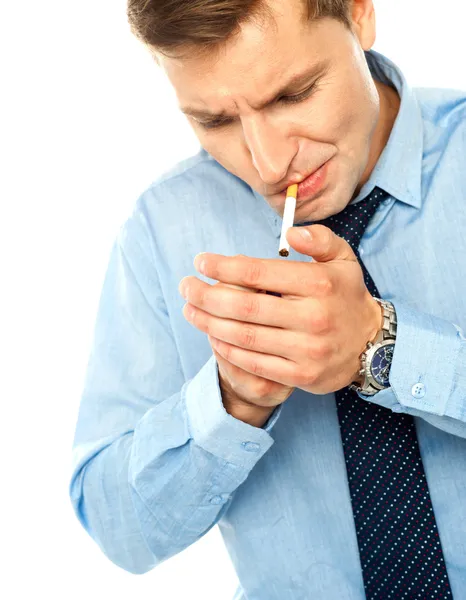 Handsome businessman with a cigarette — Stock Photo, Image