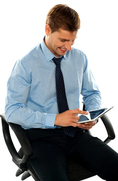 Businessman watching videos on tablet pc — Stock Photo, Image