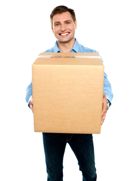 Casual guy carrying packed cardboard boxes — Stock Photo, Image