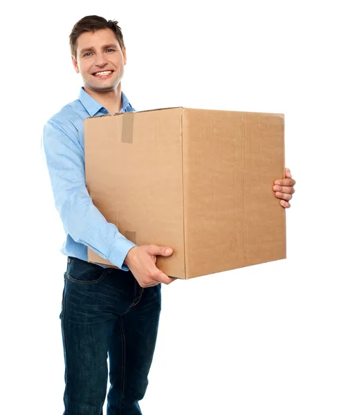 Male carrying box moving into new office — Stock Photo, Image
