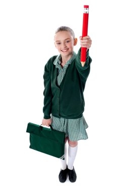 Full length shot of school girl with bag