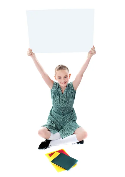 Attractive girl displaying whiteboard — Stock Photo, Image