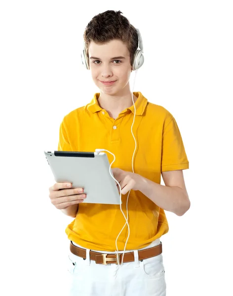 Smart boy using touch screen device — Stock Photo, Image
