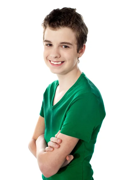 Young boy posing with folded arms — Stock Photo, Image