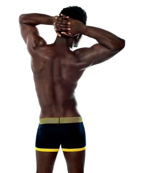 Rear view of muscular young man — Stock Photo, Image