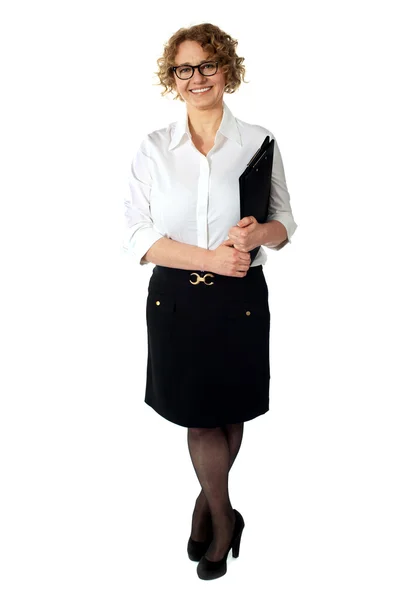 Female executive holding clipboard. Isolated — Stock Photo, Image