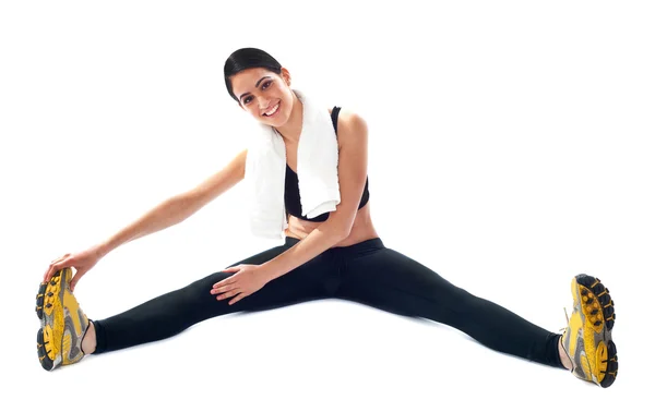 Ung vältränad kvinnlig tränare gör stretching — Stockfoto