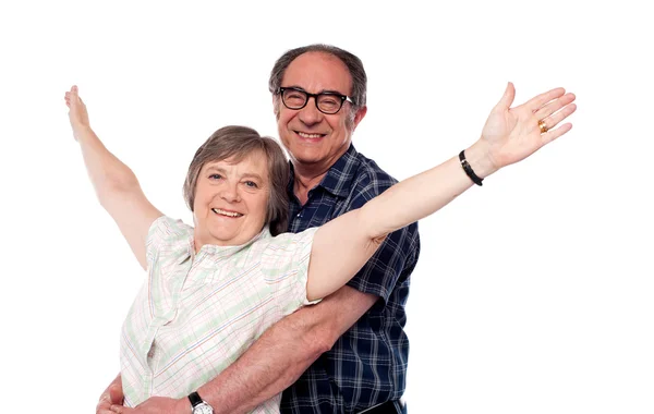 Mature woman with arms outstretched — Stock Photo, Image