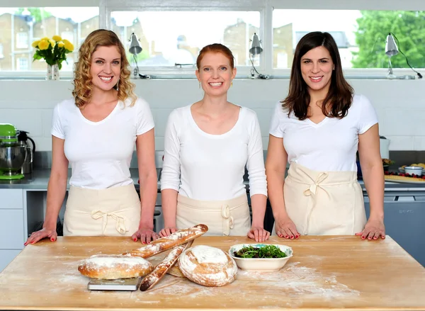 Group of young beautiful professional chefs — Stock Photo, Image