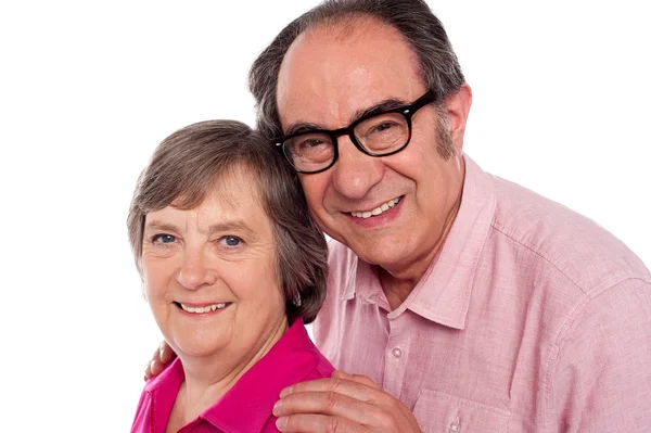Closeup portrait of smiling aged couple — Stock Photo, Image