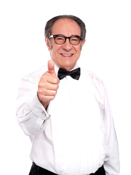 Smiling old man gesturing thumbs up — Stock Photo, Image