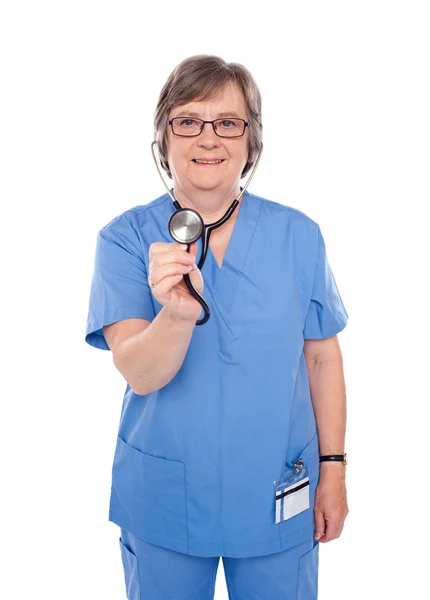 Senior doctor checking your heartbeats — Stock Photo, Image