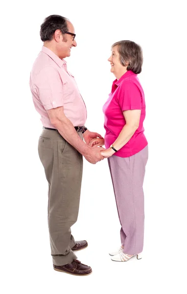 Man and woman holding each others hand — Stock Photo, Image