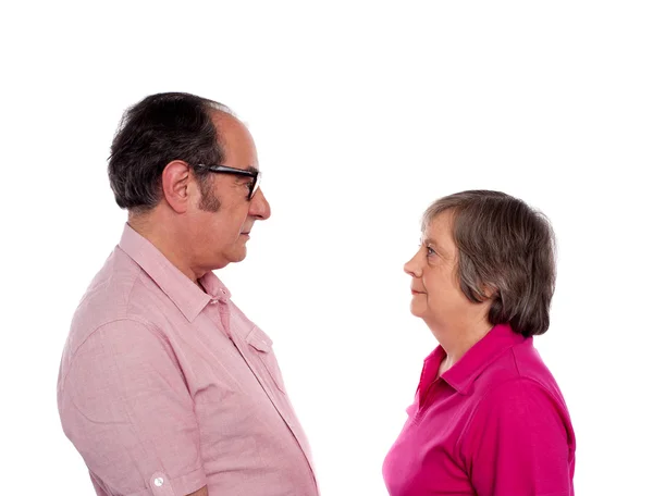 Looking into each others eyes. Aged love couple — Stock Photo, Image
