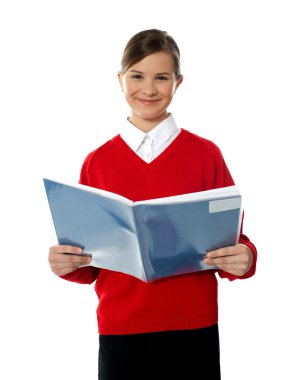 Charming school kid reading book clipart