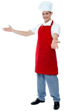 Portrait of a male chef in red uniform clipart