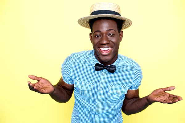 Young african guy with hat enjoying himself — Stock Photo, Image