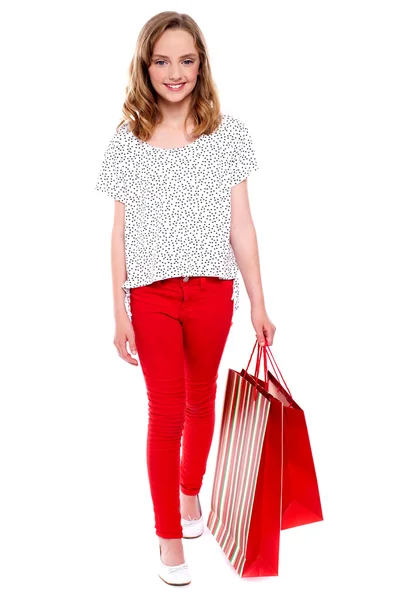 Dziewczynka z torby na zakupy — Zdjęcie stockowe