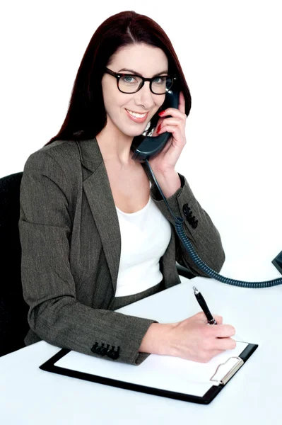 Corporate lady posing with telephone receiver — Stock Photo, Image