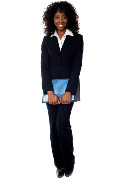 African businesswoman carrying documents — Stock Photo, Image