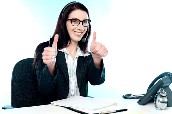 Call centre operator gesturing double thumbs up — Stock Photo, Image