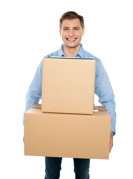 Young man holding cardboard boxes — Stock Photo, Image