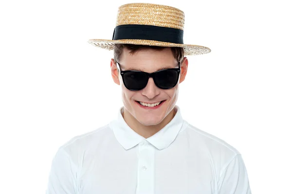 Closeup shot of smiling young man in hat — Stock Photo, Image