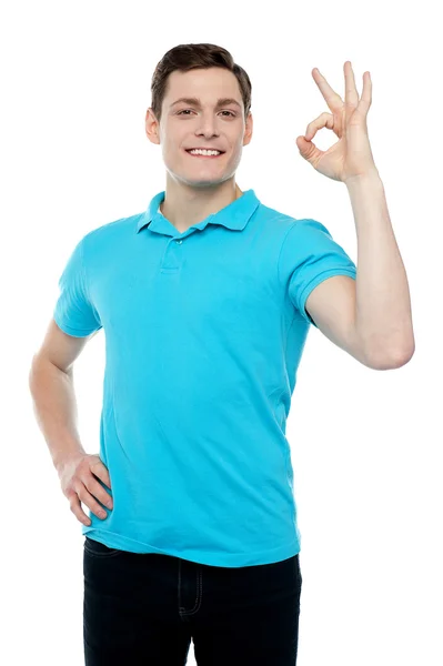Smiling guy with an excellent gesture — Stock Photo, Image