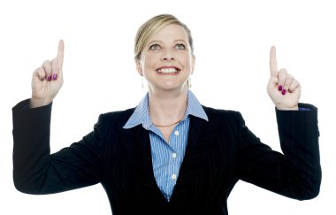 Corporate lady pointing upwards with both hands clipart