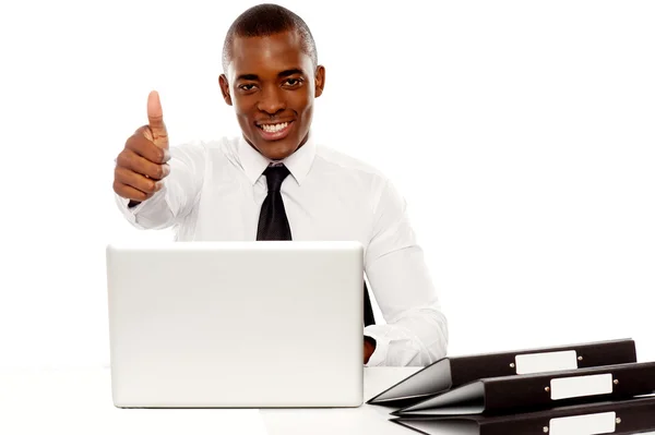 Happy young african gesturing thumbs up — Stock Photo, Image