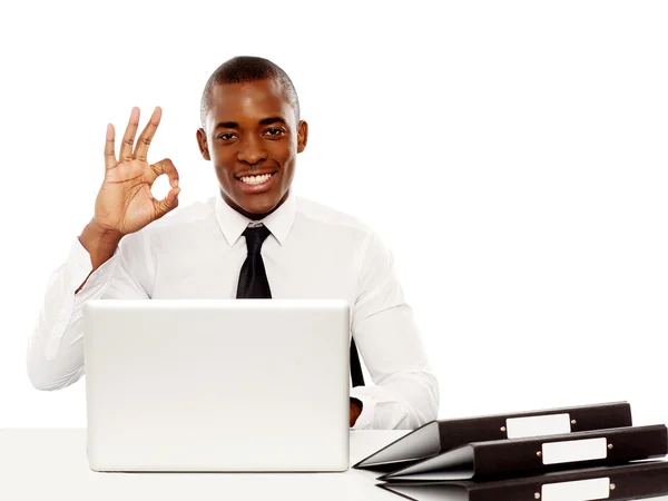 Smiling african male showing excellent symbol — Stock Photo, Image