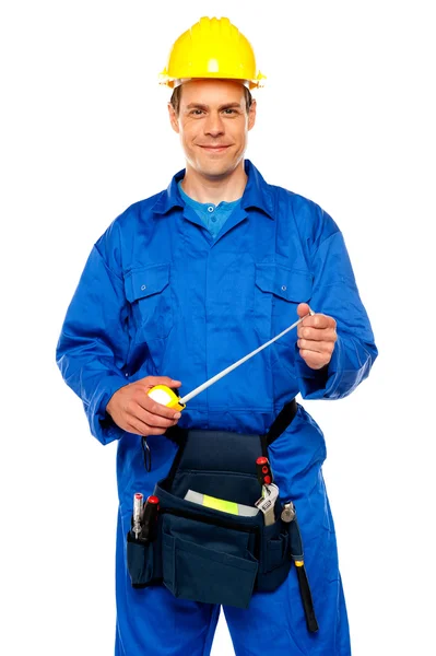 Smiling male worker wearing yellow safety hat — Stock Photo, Image