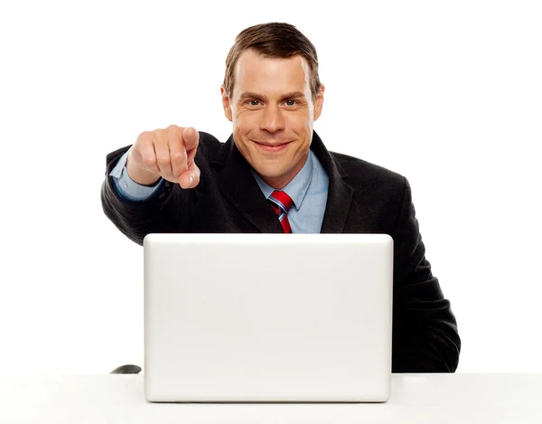 Handsome male executive pointing at you Royalty Free Stock Images