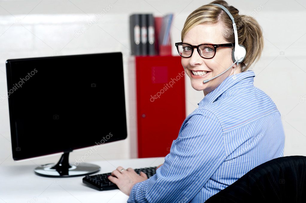 Portrait of cheerful customer support executive
