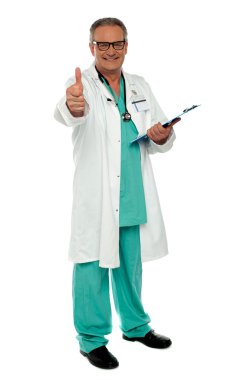 Thumbs up from senior medical professional clipart